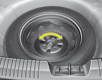 Removing and storing the spare tire