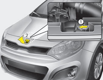 2.Go to the front of the vehicle, raise the hood slightly, push the secondary